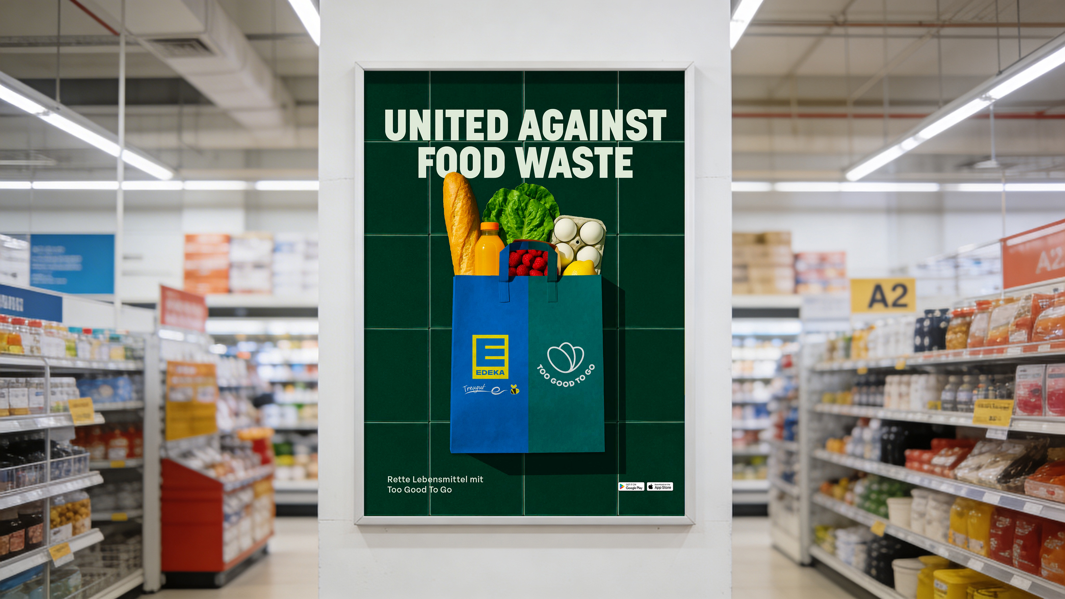 A 'United Against Food Waste' poster with Edeka mounted on a pillar in a supermarket aisle